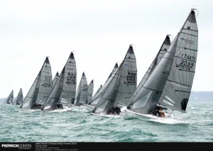 SB20 fleet sailing upwind in a breeze at the 2019 SB20 World Championship in Hyères