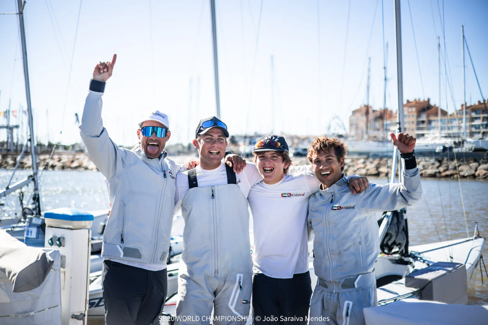 Crew celebrating on the dock in Hyères on Day 3 of the SB20 World Championship