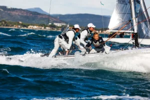 SB20 crew hiking hard through the spray in Hyères