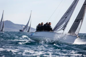 SB20 crew hiking upwind in choppy water off Hyères