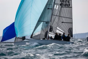 SB20s under spinnaker downwind in Hyères