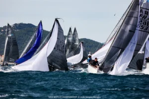 SB20 fleet racing downwind under spinnakers in Hyères