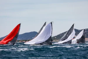 SB20s racing downwind under spinnakers off Hyères on Day 4 of the World Championship