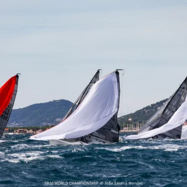 SB20s racing downwind under spinnakers off Hyères on Day 4 of the World Championship