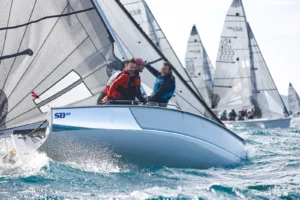 Smiling SB20 sailors on Day 5 of the 2026 SB20 World Championship in Hyères